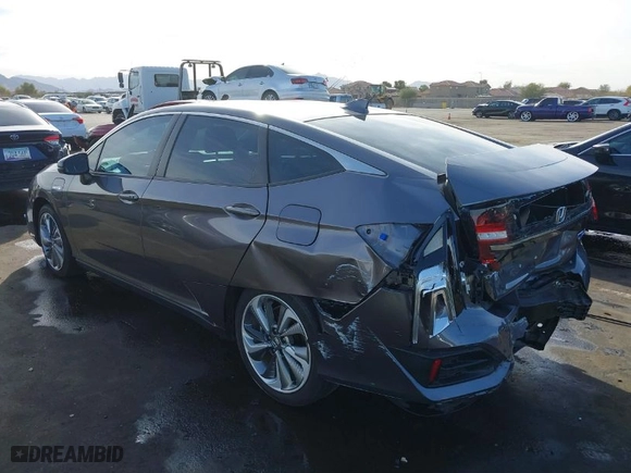 2020 Honda Clarity Plug-In Hybrid Touring with VIN JHMZC5F33LC000136, listed as a IAAI auction lot 41418652 with 48,035 mi miles. Bid and sale history available at carsss.com. Image 3.