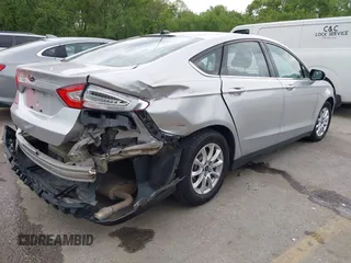 2016 Ford Fusion S z VIN 3FA6P0G76GR155001, wystawiony jako IAAI lot #42158562 z przebiegiem 147 964 mil mil oraz . Historia ofert i sprzedaży dostępna na DreamBid. Obrazek 4.