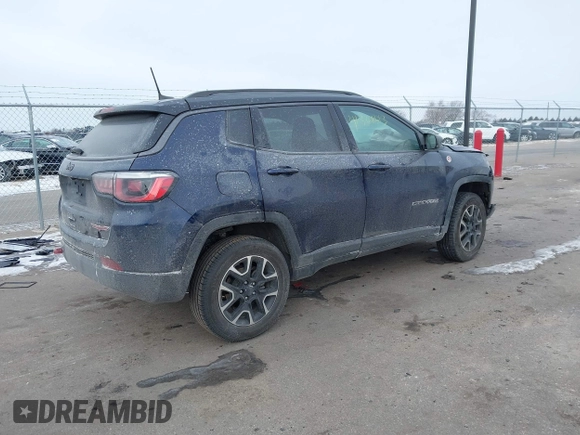 2020 Jeep Compass Trailhawk with VIN 3C4NJDDB3LT143926, listed as a IAAI auction lot 41368613 with 61,909 mi miles and . Bid and sale history available at carsss.com. Image 4.