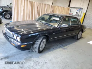 2001 Jaguar XJ with VIN SAJDA25B01MF26440, listed as a Copart auction lot 83933224 with 124,873 mi miles and Clean Title. Bid and sale history available at DreamBid. Image 1.
