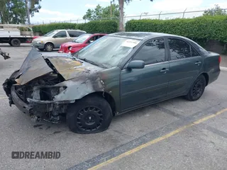 2002 Toyota Camry XLE z VIN 4T1BF32K82U530294, wystawiony jako IAAI lot #42251586 z przebiegiem Nie podano mil oraz . Historia ofert i sprzedaży dostępna na DreamBid. Obrazek 2.