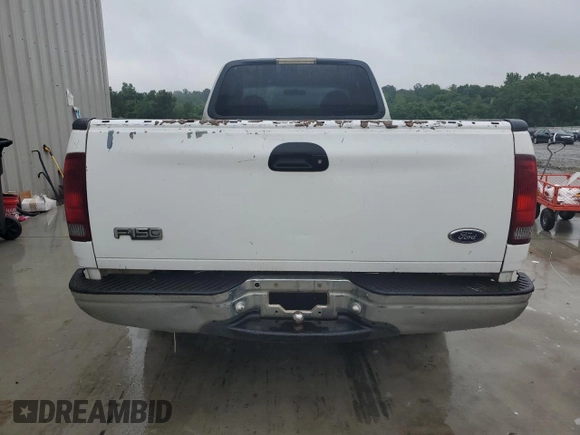 1999 Ford F-150 z VIN 1FTRX17WXXNC10010, wystawiony jako Copart lot #55607785 z przebiegiem Nie podano mil oraz Szkoda całkowita • Salvage title. Historia ofert i sprzedaży dostępna na DreamBid. Obrazek 6.