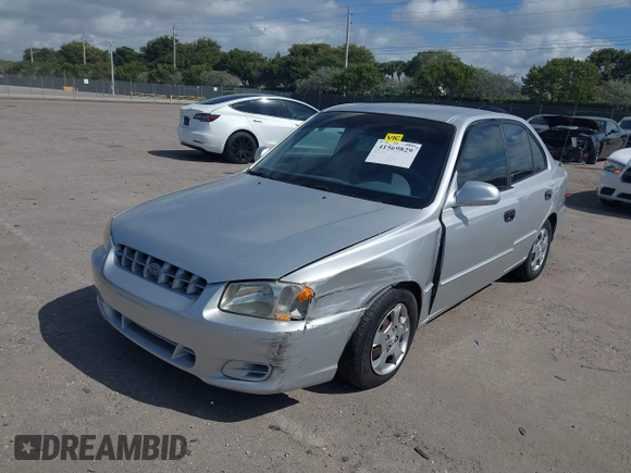 2002 Hyundai Accent GL with VIN KMHCG45C82U268756, listed as a IAAI auction lot 41569829 with 89,752 mi miles. Bid and sale history available at carsss.com. Image 6.