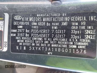 2011 Kia Sorento LX with VIN 5XYKT3A1XBG011576, listed as a IAAI auction lot 42062990 with 227,954 mi miles. Bid and sale history available at carsss.com. Image 9.