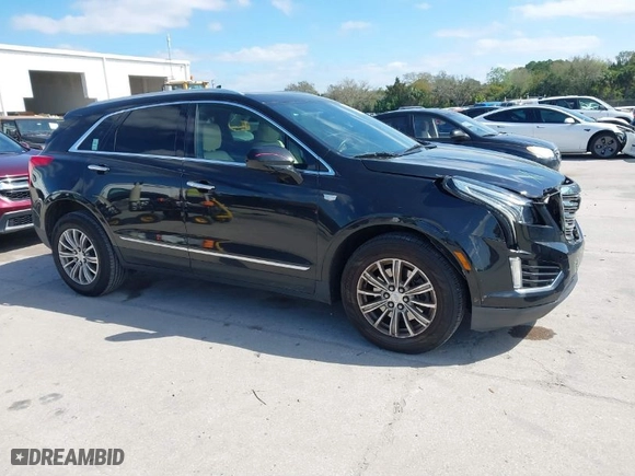 2018 Cadillac XT5 Luxury FWD with VIN 1GYKNCRS5JZ121954, listed as a IAAI auction lot 41627999 with NaN miles. Bid and sale history available at carsss.com. Image 1.