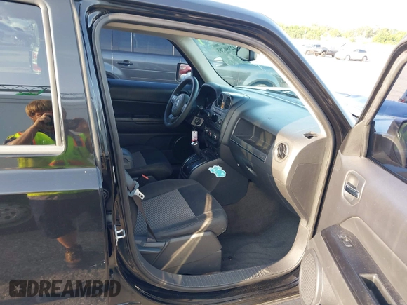 2014 Jeep Patriot Sport with VIN 1C4NJPBA3ED720412, listed as a IAAI auction lot 42390785 with 215,446 mi miles and . Bid and sale history available at DreamBid. Image 5.