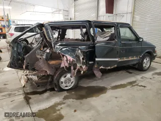 1993 Dodge Caravan Grand SE with VIN 1B4GH44R2PX757679, listed as a Copart auction lot 43034645 with 311,322 mi miles and Salvage Title. Bid and sale history available at carsss.com. Image 3.
