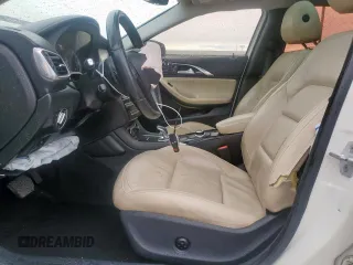 2018 Infiniti QX30 Premium with VIN SJKCH5CP2JA056283, listed as a Copart auction lot 60574585 with 102,573 mi miles and Salvage title. Bid and sale history available at DreamBid. Image 7.