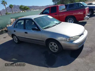 1998 Chevrolet Prizm Lsi z VIN 1Y1SK5288WZ410595, wystawiony jako IAAI lot #42159012 z przebiegiem 181 762 mil mil oraz . Historia ofert i sprzedaży dostępna na DreamBid. Obrazek 1.