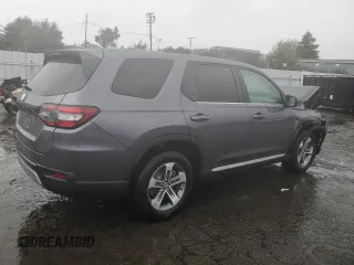 2025 Honda Pilot EX-L with VIN 5FNYG2H45SB007581, listed as a Copart auction lot 44218595 with 5,454 mi miles and Salvage Title. Bid and sale history available at carsss.com. Image 3.