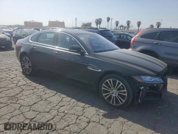 2020 Jaguar XF with VIN SAJBE4GX7LCY83474, listed as a Copart auction lot 56100914 with 36,919 mi miles and Salvage Title. Bid and sale history available at DreamBid. Image 4.