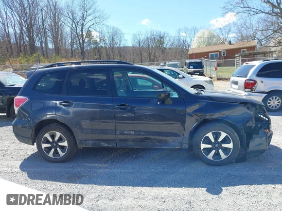 2018 Subaru Forester Premium with VIN JF2SJAGC4JH615487, listed as a IAAI auction lot 41854410 with 320,094 mi miles. Bid and sale history available at carsss.com. Image 14.