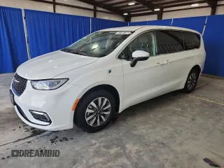 2023 Chrysler Pacifica Hybrid Touring L with VIN 2C4RC1L72PR523050, listed as a Copart auction lot 63196785 with 34,647 mi miles and Clean title. Bid and sale history available at DreamBid. Image 1.