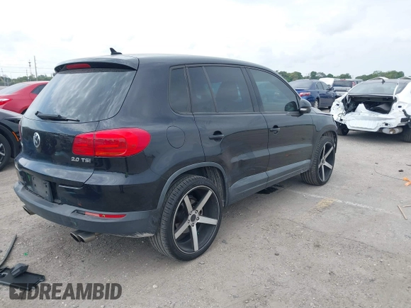 2014 Volkswagen Tiguan SE z VIN WVGAV3AXXEW535128, wystawiony jako IAAI lot #41882213 z przebiegiem 103 161 mil mil oraz . Historia ofert i sprzedaży dostępna na DreamBid. Obrazek 4.