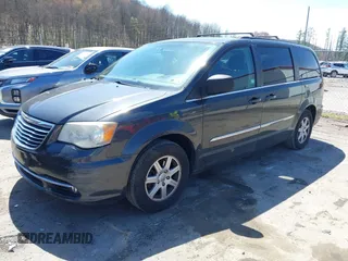 2012 Chrysler Town & Country Touring with VIN 2C4RC1BG9CR313105, listed as a IAAI auction lot 41971919 with 165,986 mi miles. Bid and sale history available at carsss.com. Image 2.
