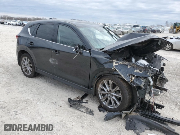 2020 Mazda CX-5 Grand Touring with VIN JM3KFADMXL0835481, listed as a Copart auction lot 44276955 with 36,862 mi miles and Salvage Title. Bid and sale history available at DreamBid. Image 4.