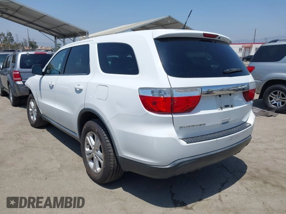 2013 Dodge Durango SXT with VIN 1C4RDHAG0DC669587, listed as a IAAI auction lot 42599143 with 126,748 mi miles and . Bid and sale history available at DreamBid. Image 3.