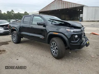 2024 GMC Canyon 4WD AT4 with VIN 1GTP6DEK3R1219220, listed as a Copart auction lot 68636524 with 401 mi miles and Salvage Title. Bid and sale history available at carsss.com. Image 4.