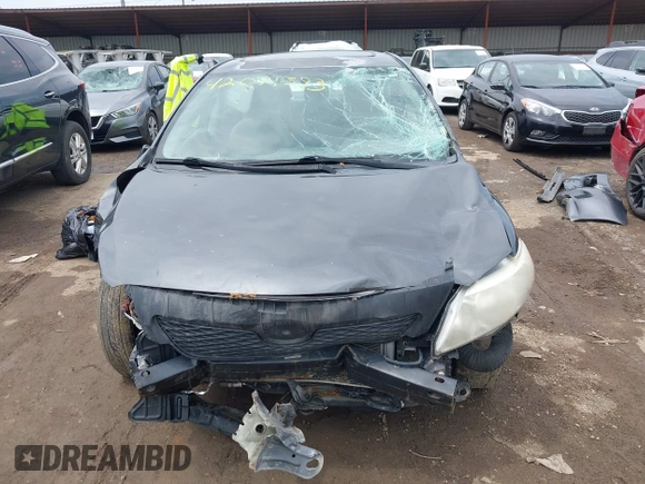 2010 Toyota Corolla z VIN 1NXBU4EE7AZ313190, wystawiony jako IAAI lot #42071393 z przebiegiem Nie podano mil oraz . Historia ofert i sprzedaży dostępna na DreamBid. Obrazek 11.