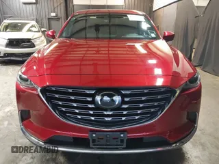 2023 Mazda CX-9 Signature z VIN JM3TCBEY4P0634153, wystawiony jako IAAI lot #42132856 z przebiegiem 25 131 mil mil oraz . Historia ofert i sprzedaży dostępna na DreamBid. Obrazek 12.