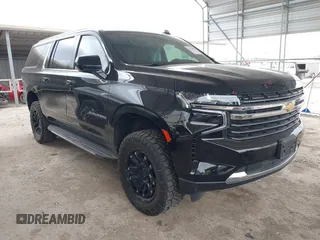 2021 Chevrolet Suburban LT z VIN 1GNSCCKDXMR421833, wystawiony jako IAAI lot #41738389 z przebiegiem 56 757 mil mil oraz . Historia ofert i sprzedaży dostępna na DreamBid. Obrazek 1.