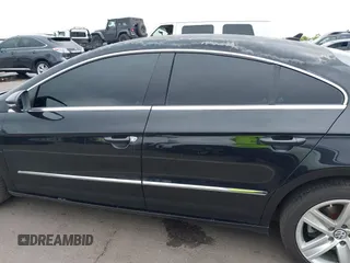 2013 Volkswagen CC Sport with VIN WVWBP7AN6DE504679, listed as a IAAI auction lot 42034362 with 148,527 mi miles. Bid and sale history available at carsss.com. Image 15.