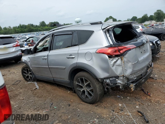 2018 Toyota RAV4 Hybrid SE with VIN JTMJJREV6JD238570, listed as a Copart auction lot 63972534 with Not provided miles and Salvage title. Bid and sale history available at DreamBid. Image 2.