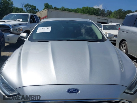 2017 Ford Fusion SE z VIN 3FA6P0HDXHR238713, wystawiony jako IAAI lot #42304140 z przebiegiem 157 630 mil mil oraz . Historia ofert i sprzedaży dostępna na DreamBid. Obrazek 12.