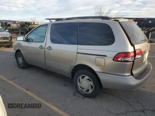 2002 Toyota Sienna LE with VIN 4T3ZF13C12U486009, listed as a Copart auction lot 87877695 with 250,778 mi miles and Salvage Title. Bid and sale history available at carsss.com. Image 2.