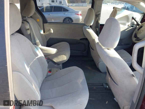 2012 Toyota Sienna with VIN 5TDKA3DC0CS013845, listed as a IAAI auction lot 42010389 with 209,272 mi miles and . Bid and sale history available at DreamBid. Image 8.