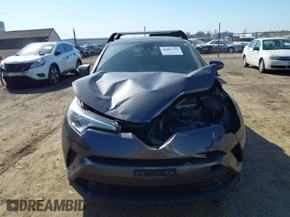 2019 Toyota C-HR XLE with VIN JTNKHMBX4K1025527, listed as a IAAI auction lot 41807738 with 64,505 mi miles and . Bid and sale history available at DreamBid. Image 13.