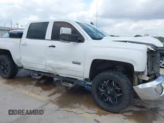 2017 Chevrolet Silverado 1500 LT with VIN 3GCPCREC6HG311064, listed as a IAAI auction lot 42026646 with 242,195 mi miles and . Bid and sale history available at DreamBid. Image 16.