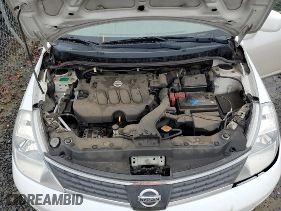 2007 Nissan Versa 1.8 SL with VIN 3N1BC11E67L402475, listed as a Copart auction lot 84464734 with 62,399 mi miles and Salvage Title. Bid and sale history available at carsss.com. Image 11.
