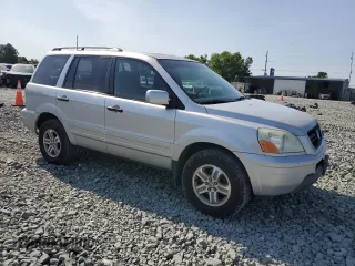 2005 Honda Pilot EX-L with VIN 2HKYF18505H500452, listed as a Copart auction lot 57552535 with 282,733 mi miles and Salvage title. Bid and sale history available at DreamBid. Image 4.