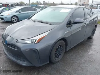 2019 Toyota Prius L Eco with VIN JTDKARFU3K3099256, listed as a IAAI auction lot 41813619 with 169,900 mi miles. Bid and sale history available at carsss.com. Image 2.