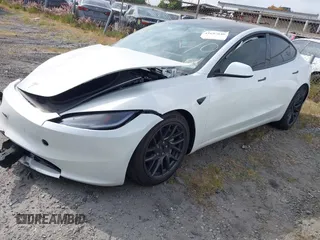 2024 Tesla Model 3 Long Range with VIN 5YJ3E1EB7RF854092, listed as a IAAI auction lot 41697646 with 7,371 mi miles and . Bid and sale history available at DreamBid. Image 19.