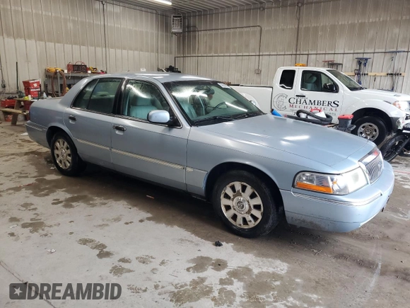 2003 Mercury Grand Marquis LS Premium z VIN 2MEHM75W33X645484, wystawiony jako Copart lot #58664585 z przebiegiem 145 064 mil mil oraz Czysty tytuł • Clean title. Historia ofert i sprzedaży dostępna na DreamBid. Obrazek 4.