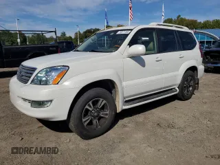 2004 Lexus GX 470 with VIN JTJBT20XX40033938, listed as a Copart auction lot 70871164 with 214,565 mi miles and Salvage Title. Bid and sale history available at carsss.com. Image 1.