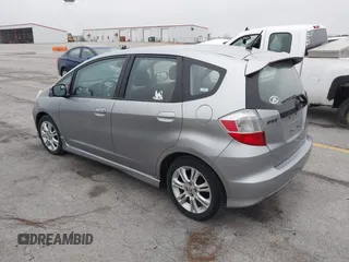 2009 Honda Fit Sport with VIN JHMGE88469S063030, listed as a IAAI auction lot 42064670 with 156,791 mi miles. Bid and sale history available at carsss.com. Image 3.