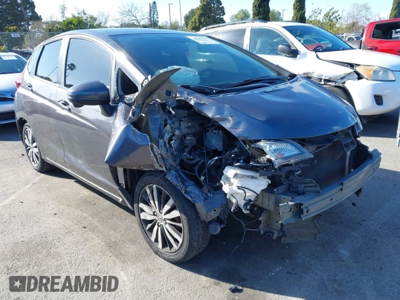 2015 Honda Fit EX-L z VIN 3HGGK5H89FM774299, wystawiony jako IAAI lot #41793448 z przebiegiem 142 228 mil mil oraz . Historia ofert i sprzedaży dostępna na DreamBid. Obrazek 1.
