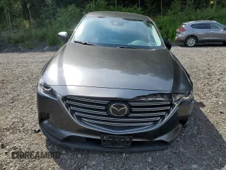 2019 Mazda CX-9 Touring z VIN JM3TCBCY5K0328655, wystawiony jako Copart lot #64627255 z przebiegiem 54 658 mil mil oraz Szkoda całkowita • Salvage title. Historia ofert i sprzedaży dostępna na DreamBid. Obrazek 5.