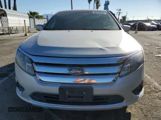 2010 Ford Fusion Hybrid с VIN 3FADP0L31AR258408, выставлен на аукционе Copart как лот 46703935 с пробегом 151 402 миль миль и Списание • Salvage title. История ставок и продаж доступна на DreamBid. Изображение 5.