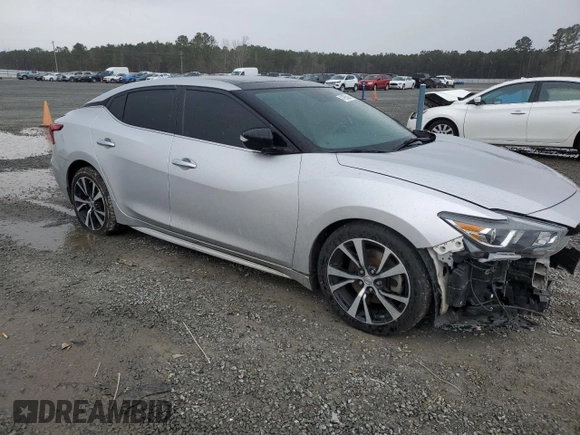 2018 Nissan Maxima SV with VIN 1N4AA6AP2JC388337, listed as a Copart auction lot 47955595 with 94,729 mi miles and Salvage Title. Bid and sale history available at DreamBid. Image 4.