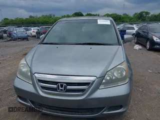 2007 Honda Odyssey EX-L with VIN 5FNRL38627B055862, listed as a IAAI auction lot 42148442 with 225,627 mi miles. Bid and sale history available at carsss.com. Image 6.