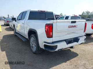 2021 GMC Sierra 1500 Denali z VIN 3GTU9FEL1MG349215, wystawiony jako IAAI lot #42585810 z przebiegiem 97 465 mil mil oraz . Historia ofert i sprzedaży dostępna na DreamBid. Obrazek 3.