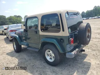 2000 Jeep Wrangler Sahara with VIN 1J4FA59S2YP750795, listed as a Copart auction lot 52353503 with 0 mi miles and Salvage Title. Bid and sale history available at carsss.com. Image 2.