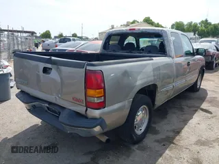 2002 GMC Sierra 1500 SLE with VIN 2GTEC19V821407265, listed as a IAAI auction lot 42087634 with 196,745 mi miles and . Bid and sale history available at DreamBid. Image 4.