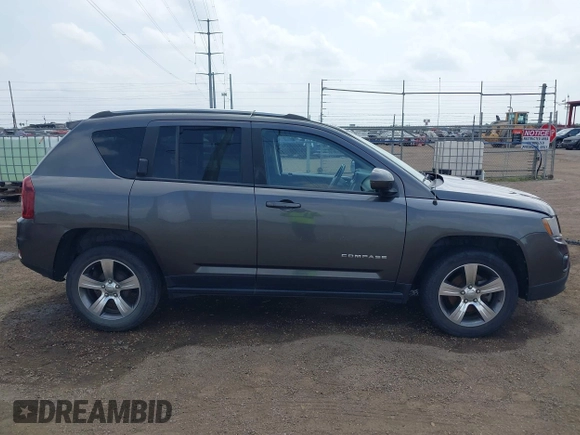 2016 Jeep Compass High Altitude Edition with VIN 1C4NJCEA1GD720223, listed as a IAAI auction lot 41879625 with 147,458 mi miles. Bid and sale history available at carsss.com. Image 13.