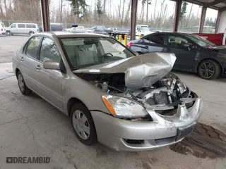2005 Mitsubishi Lancer ES with VIN JA3AJ26E65U017027, listed as a IAAI auction lot 41765578 with 58,698 mi miles. Bid and sale history available at carsss.com. Image 1.