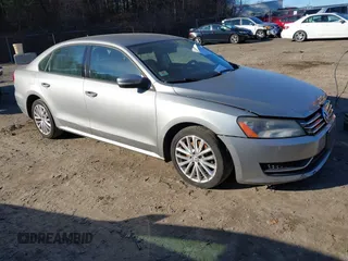 2014 Volkswagen Passat S z VIN 1VWAP7A30EC008863, wystawiony jako IAAI lot #41004815 z przebiegiem 219 881 mil mil oraz . Historia ofert i sprzedaży dostępna na DreamBid. Obrazek 1.